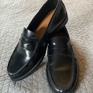 Woman’s black penny loafers